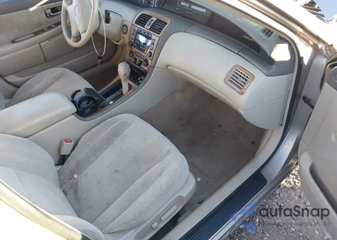 2000 Toyota Avalon Xl z USA, uszkodzony, nr VIN 4T1BF28B0YU112094